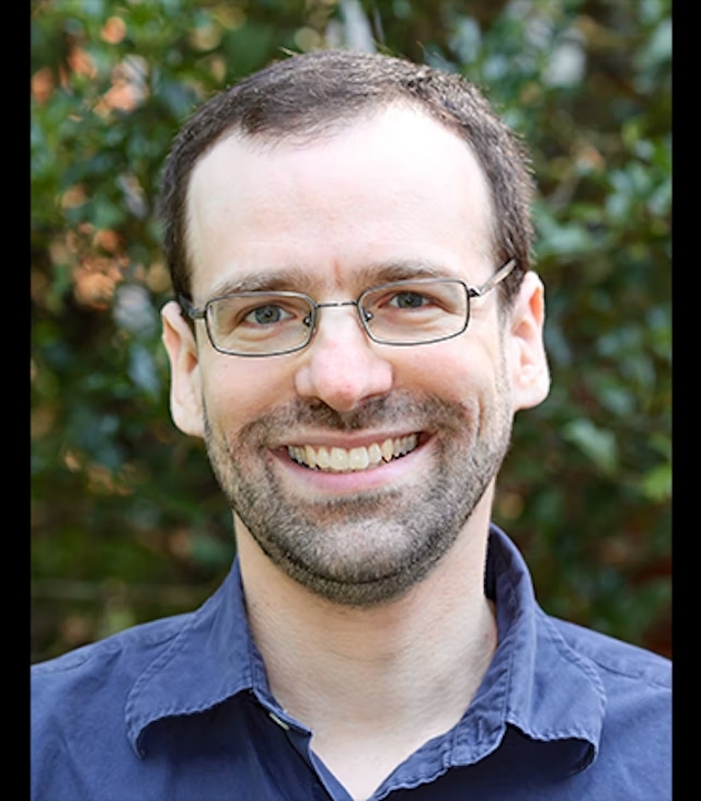 Professional headshot of Tufts University faculty member Jeffrey Foster